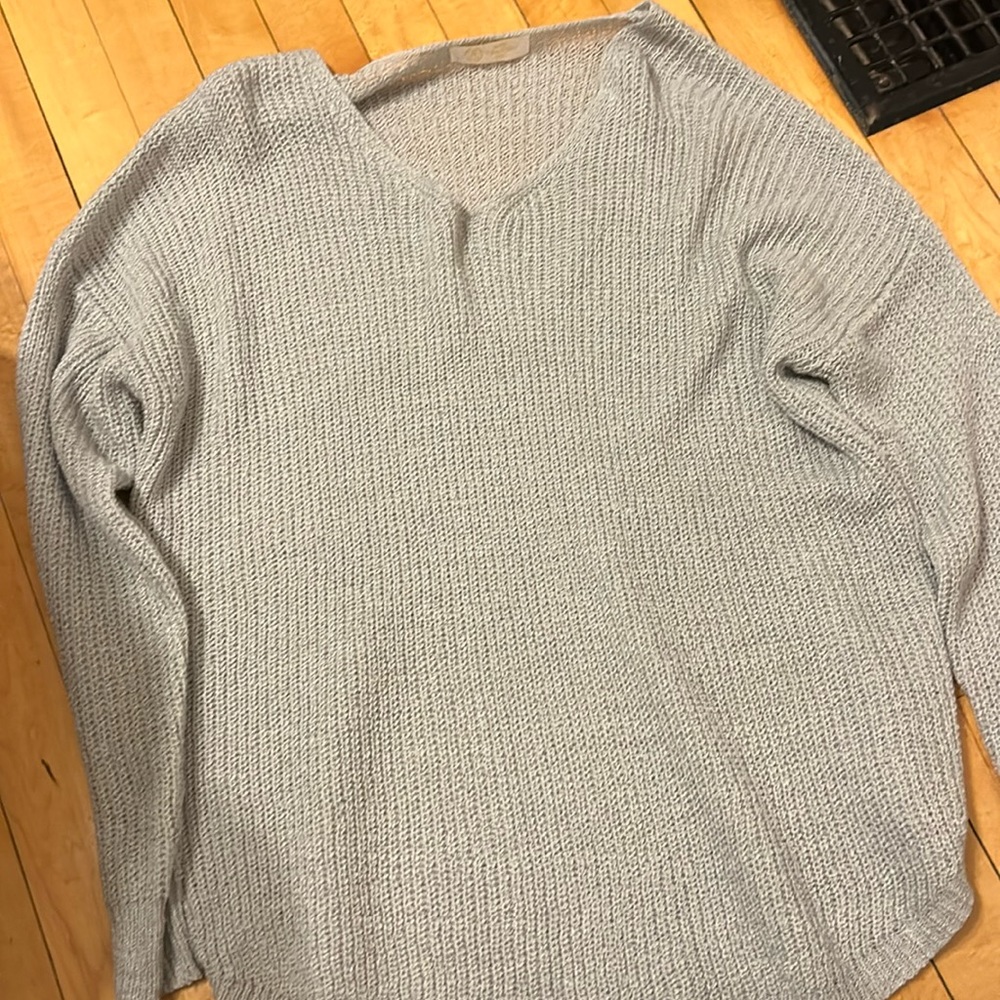 Local store grey size unknown sweater. Fits me like a medium
